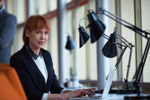 business woman working on computer at modern office
